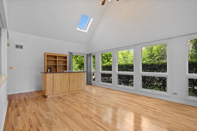 1280 Lawrence Ave, Lake Forest, IL 60045 - unfurnished sunroom featuring vaulted ceiling and a skylight