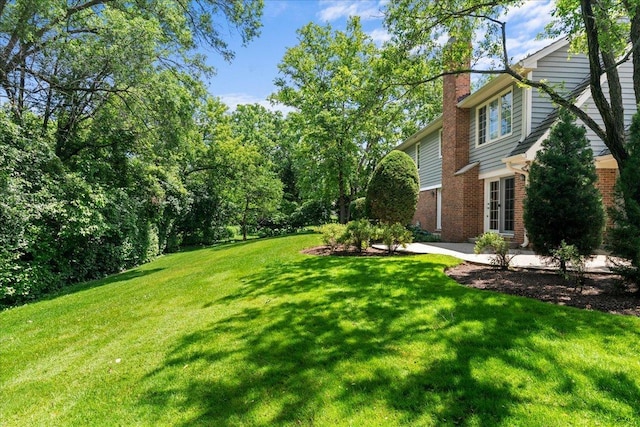 1280 Lawrence Ave, Lake Forest, IL 60045 - view of grassy yard with a patio area
