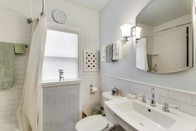 1003 Mapleton Ave, Oak Park, IL 60302 - bathroom with tile walls, a tile shower, plenty of natural light, and wainscoting