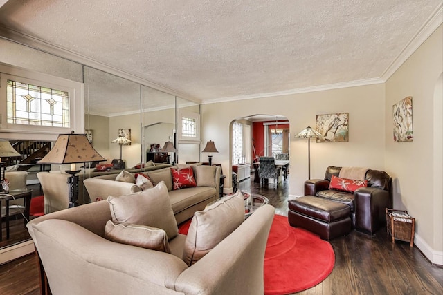 1003 Mapleton Ave, Oak Park, IL 60302 - living area with arched walkways, a textured ceiling, wood finished floors, and crown molding