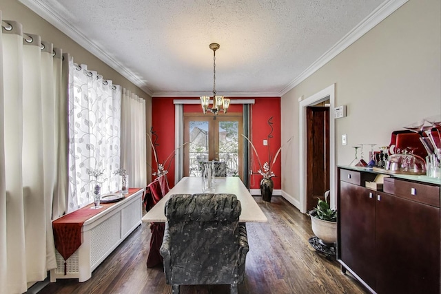 1003 Mapleton Ave, Oak Park, IL 60302 - dining room with a chandelier, a textured ceiling, dark wood-style flooring, ornamental molding, and radiator heating unit