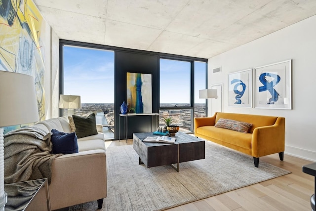 234 W Polk St Unit 3403, Chicago, IL 60607 - living room with a wall of windows, healthy amount of natural light, and wood finished floors