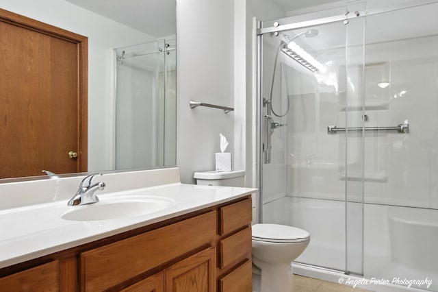 312 Whitaker Trl Unit 312, Mchenry, IL 60050 - bathroom featuring a shower stall, vanity, and tile patterned flooring