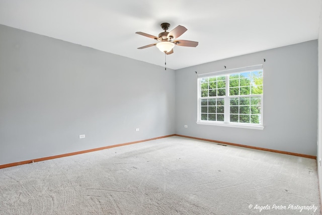 312 Whitaker Trl Unit 312, Mchenry, IL 60050 - carpeted empty room featuring baseboards and ceiling fan