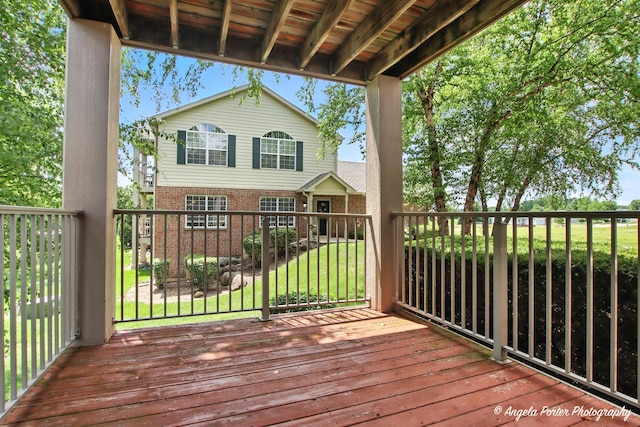 312 Whitaker Trl Unit 312, Mchenry, IL 60050 - wooden terrace with a lawn