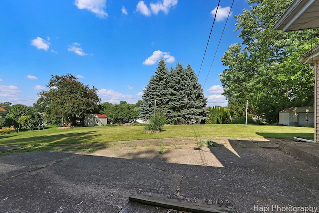 34719 N Nokomis Trl, Mchenry, IL 60051 - view of grassy yard with an outdoor structure
