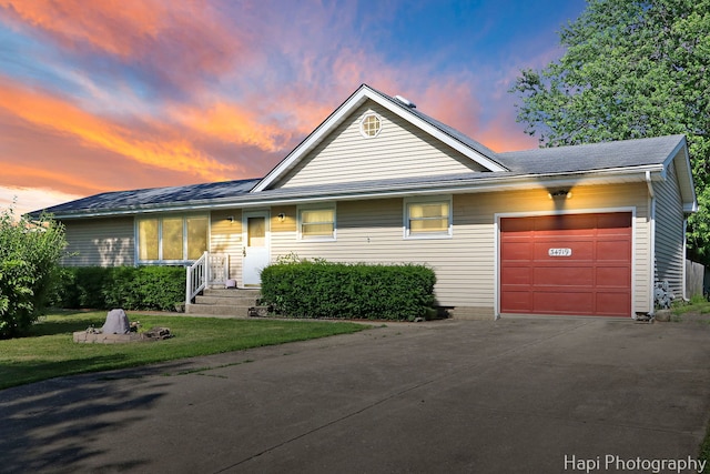 34719 N Nokomis Trl, Mchenry, IL 60051 - ranch-style house with an attached garage, concrete driveway, and a front lawn