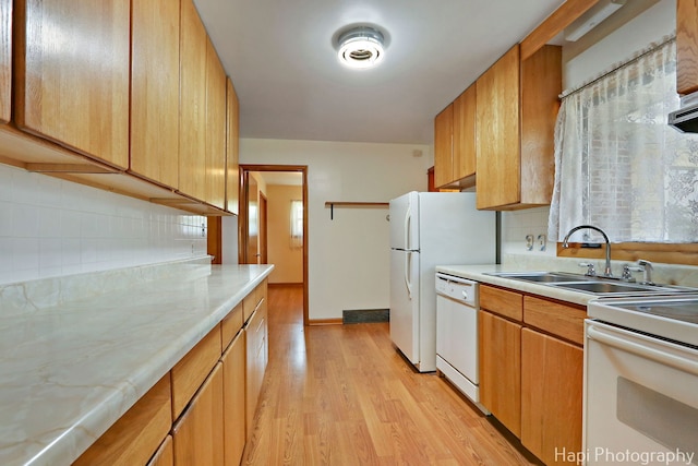 34719 N Nokomis Trl, Mchenry, IL 60051 - kitchen featuring white appliances, light countertops, light wood-style floors, and decorative backsplash