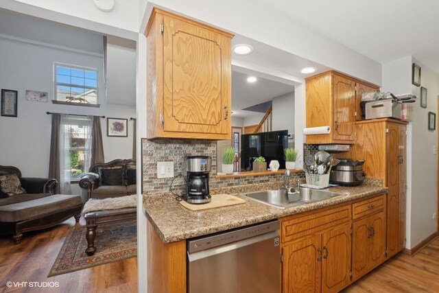 3749 W Glen Dr Unit 1001, Alsip, IL 60803 - kitchen featuring stainless steel dishwasher, light wood finished floors, backsplash, light countertops, and recessed lighting