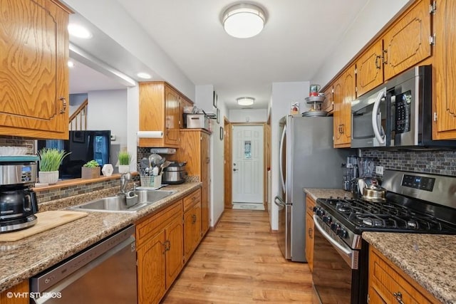 3749 W Glen Dr Unit 1001, Alsip, IL 60803 - kitchen with stainless steel appliances, decorative backsplash, brown cabinetry, and recessed lighting