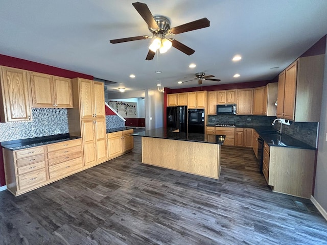 1805 Clarence Rd, Joliet, IL 60431 - kitchen featuring black appliances, tasteful backsplash, dark countertops, a ceiling fan, and dark wood finished floors