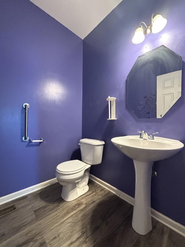 1805 Clarence Rd, Joliet, IL 60431 - bathroom with wood finished floors and toilet