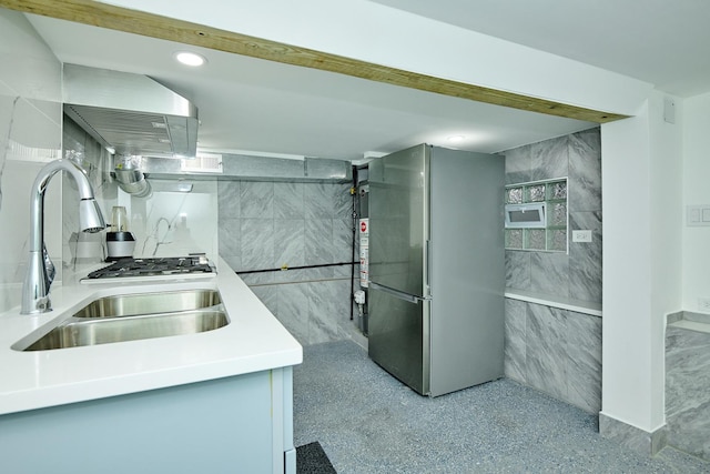 1931 N Leamington Ave, Chicago, IL 60639 - kitchen with freestanding refrigerator, ventilation hood, tile walls, light countertops, and recessed lighting