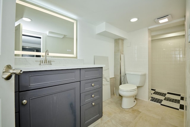 1931 N Leamington Ave, Chicago, IL 60639 - full bath with vanity, tile walls, a tile shower, tile patterned flooring, and recessed lighting