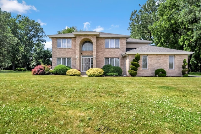 15516 Frontage Rd, Markham, IL 60428 - view of front facade with a front yard and brick siding