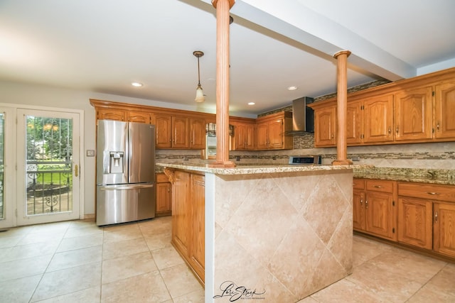 15516 Frontage Rd, Markham, IL 60428 - kitchen featuring stainless steel refrigerator with ice dispenser, wall chimney range hood, ornate columns, decorative backsplash, and recessed lighting