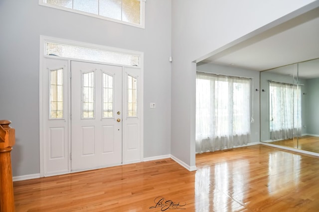 15516 Frontage Rd, Markham, IL 60428 - foyer with wood finished floors, plenty of natural light, and a high ceiling