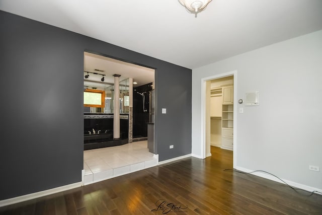 15516 Frontage Rd, Markham, IL 60428 - empty room featuring wood finished floors and baseboards