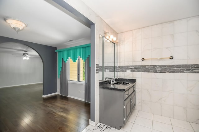 15516 Frontage Rd, Markham, IL 60428 - bathroom featuring a ceiling fan, vanity, and wood-type flooring