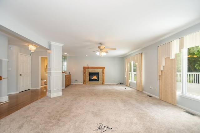 15516 Frontage Rd, Markham, IL 60428 - unfurnished living room with light colored carpet, plenty of natural light, and ceiling fan