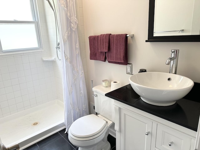 652 Beckman Dr, Kankakee, IL 60901 - bathroom with a shower stall, vanity, and tile patterned flooring