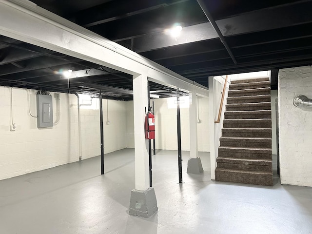 652 Beckman Dr, Kankakee, IL 60901 - basement with electric panel and stairway