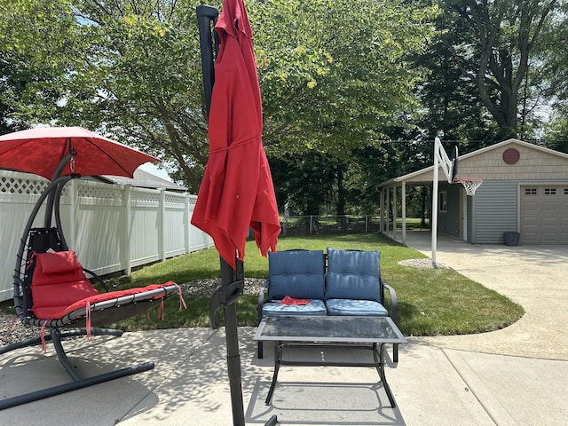 652 Beckman Dr, Kankakee, IL 60901 - view of patio with an outdoor structure and an outdoor living space