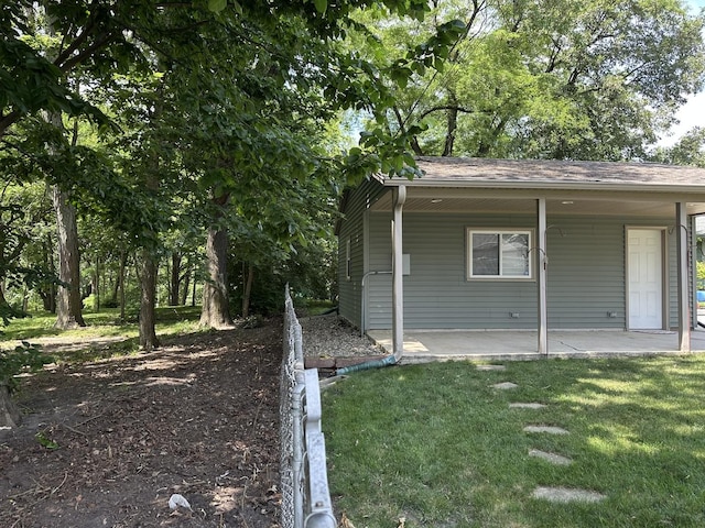 652 Beckman Dr, Kankakee, IL 60901 - view of side of home with a yard