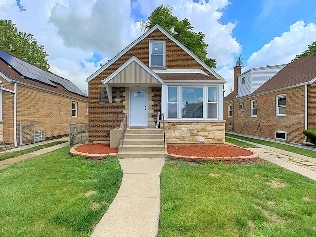 2808 W 84th St, Chicago, IL 60652 - bungalow-style house with a front yard and stone siding
