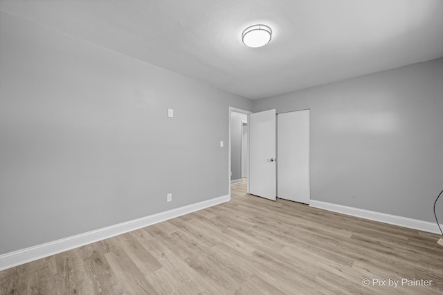 4421 Elmleaf Dr, Mchenry, IL 60051 - empty room featuring light wood-style flooring and baseboards