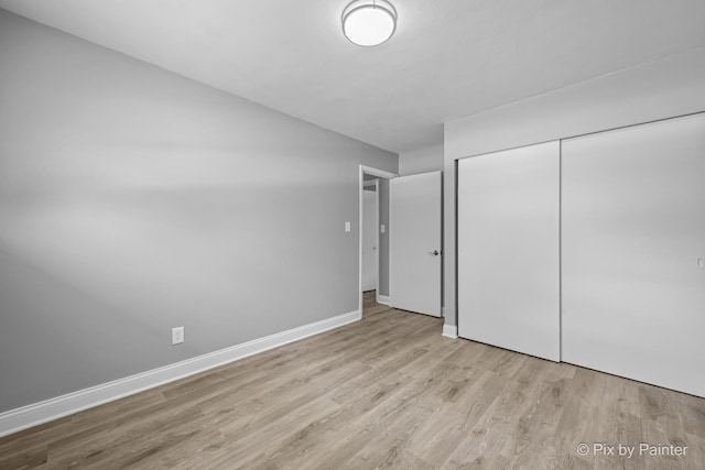 4421 Elmleaf Dr, Mchenry, IL 60051 - unfurnished bedroom featuring wood finished floors and a closet
