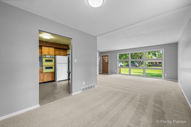4421 Elmleaf Dr, Mchenry, IL 60051 - unfurnished living room with baseboards and carpet