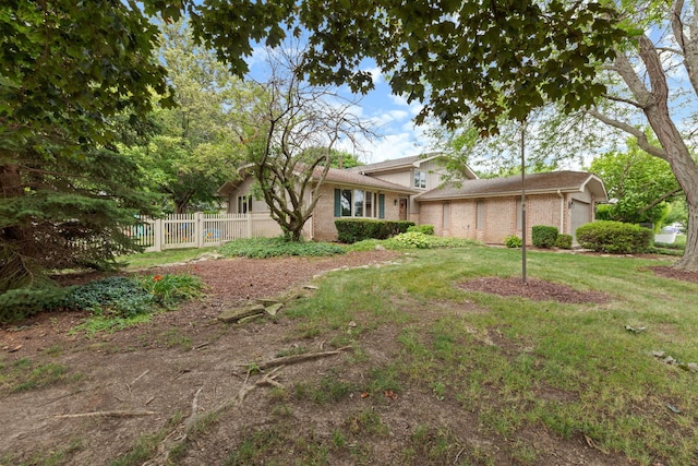 13635 W Ironwood Cir, Homer Glen, IL 60491 - view of front of home featuring an attached garage and brick siding