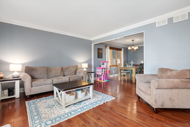 13635 W Ironwood Cir, Homer Glen, IL 60491 - living area featuring crown molding, a chandelier, and hardwood / wood-style floors