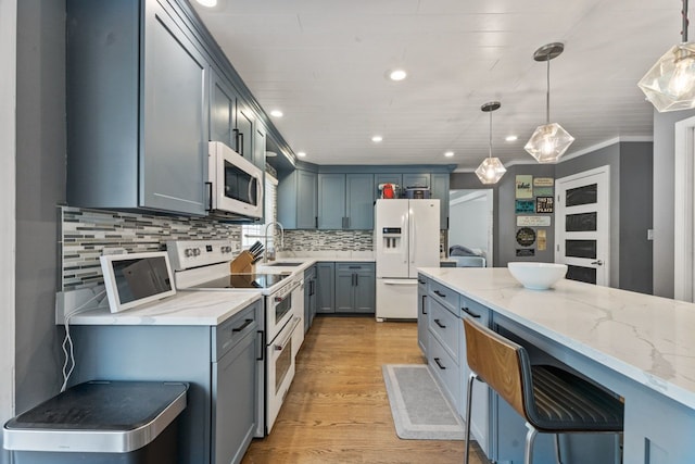 1507 Eton Ln, Naperville, IL 60565 - kitchen featuring white appliances, light stone countertops, light wood-style floors, decorative backsplash, and decorative light fixtures
