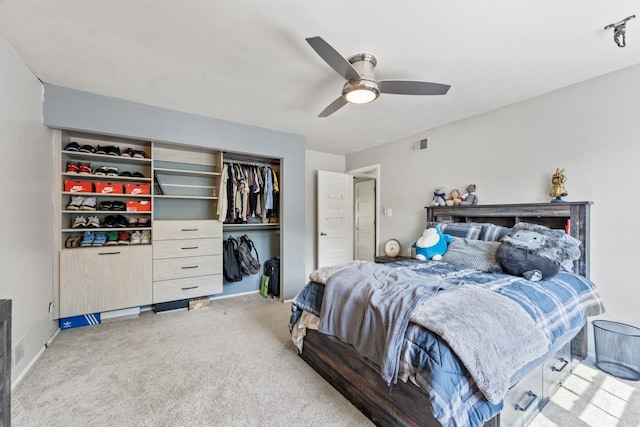 1507 Eton Ln, Naperville, IL 60565 - bedroom with a closet, light colored carpet, and ceiling fan