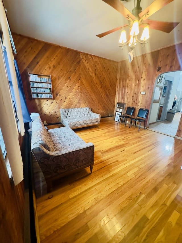 4817 W 28th St, Cicero, IL 60804 - bedroom with wooden walls, wood finished floors, and arched walkways