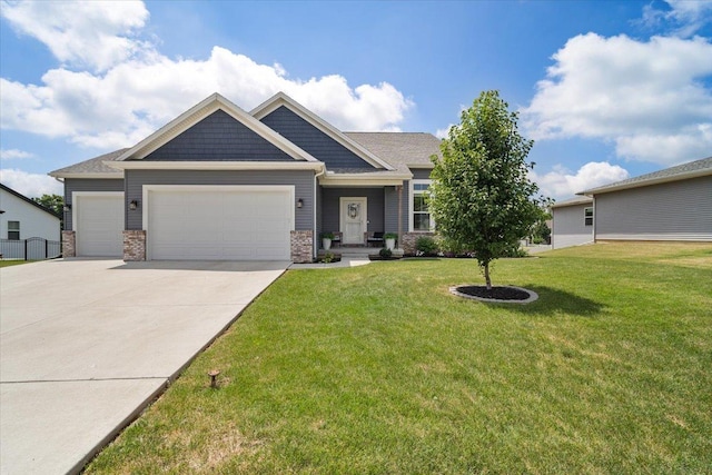 507 Raef Rd, Downs, IL 61736 - craftsman house with a garage, a front lawn, driveway, and brick siding