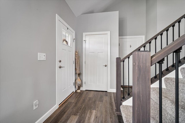 507 Raef Rd, Downs, IL 61736 - entryway featuring wood finished floors, stairway, and vaulted ceiling