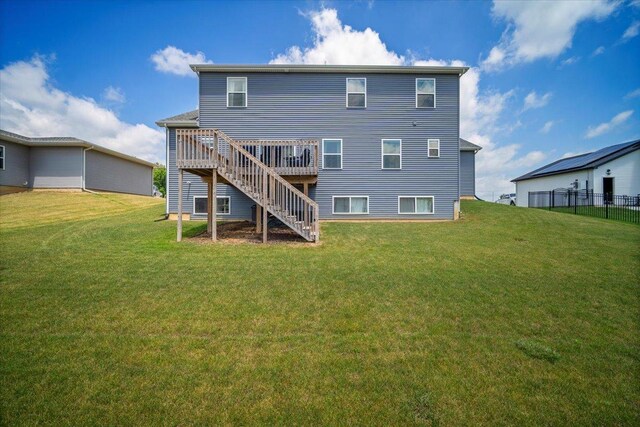 507 Raef Rd, Downs, IL 61736 - rear view of house with a wooden deck and stairs