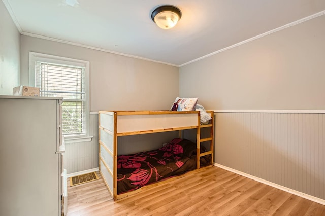 11341 S Spaulding Ave, Chicago, IL 60655 - bedroom with crown molding, wood finished floors, and a wainscoted wall