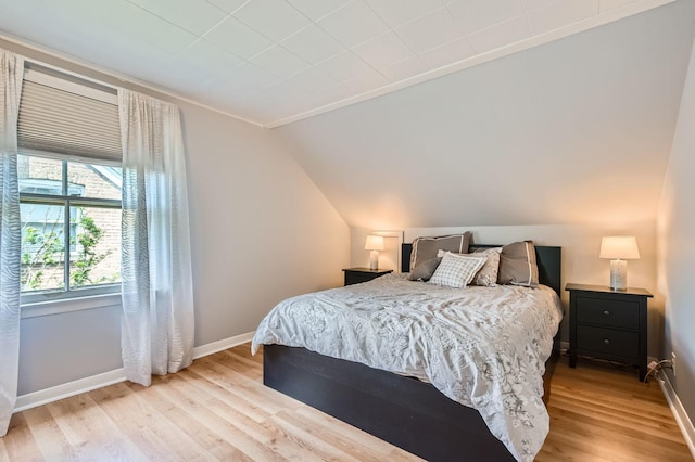 11341 S Spaulding Ave, Chicago, IL 60655 - bedroom with light wood-type flooring and vaulted ceiling