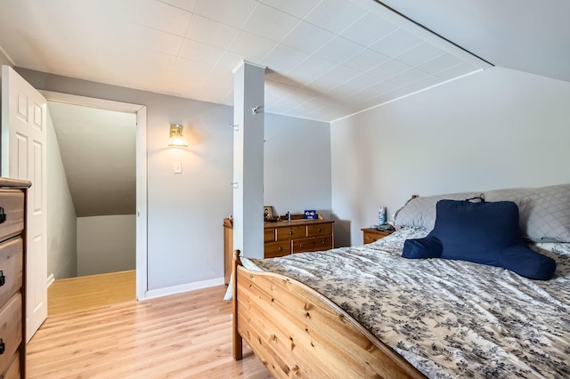 11341 S Spaulding Ave, Chicago, IL 60655 - bedroom with lofted ceiling and light wood-style flooring