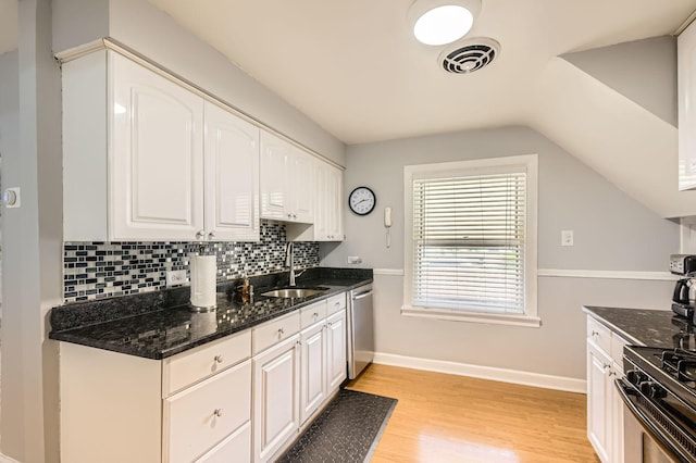 11341 S Spaulding Ave, Chicago, IL 60655 - kitchen featuring dishwasher, white cabinets, tasteful backsplash, vaulted ceiling, and light wood-type flooring