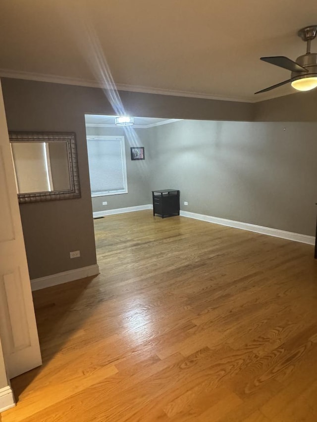 8221 Meadowwood Ave, Woodridge, IL 60517 - empty room with crown molding, light wood finished floors, and a ceiling fan