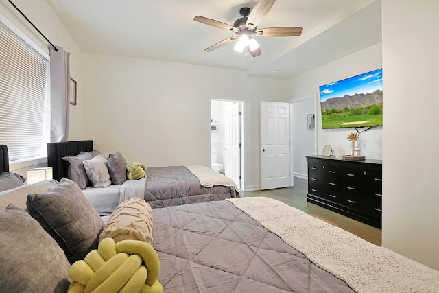 2355 W Congress Pkwy Unit 1, Chicago, IL 60612 - bedroom with wood finished floors, ceiling fan, and connected bathroom
