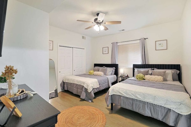 2355 W Congress Pkwy Unit 1, Chicago, IL 60612 - bedroom featuring light wood finished floors, a closet, and ceiling fan