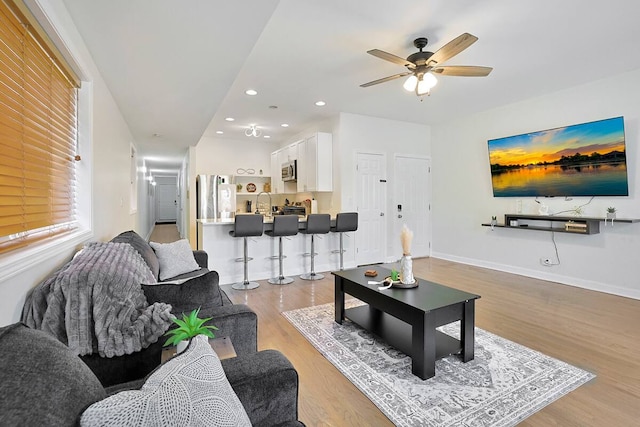 2355 W Congress Pkwy Unit 1, Chicago, IL 60612 - living room with light wood finished floors, recessed lighting, and ceiling fan