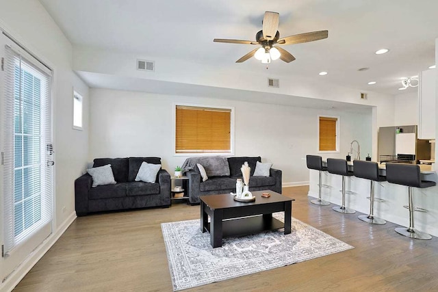 2355 W Congress Pkwy Unit 1, Chicago, IL 60612 - living area with light wood-style flooring, a ceiling fan, and recessed lighting