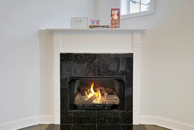 2355 W Congress Pkwy Unit 1, Chicago, IL 60612 - detailed view of baseboards and a tile fireplace